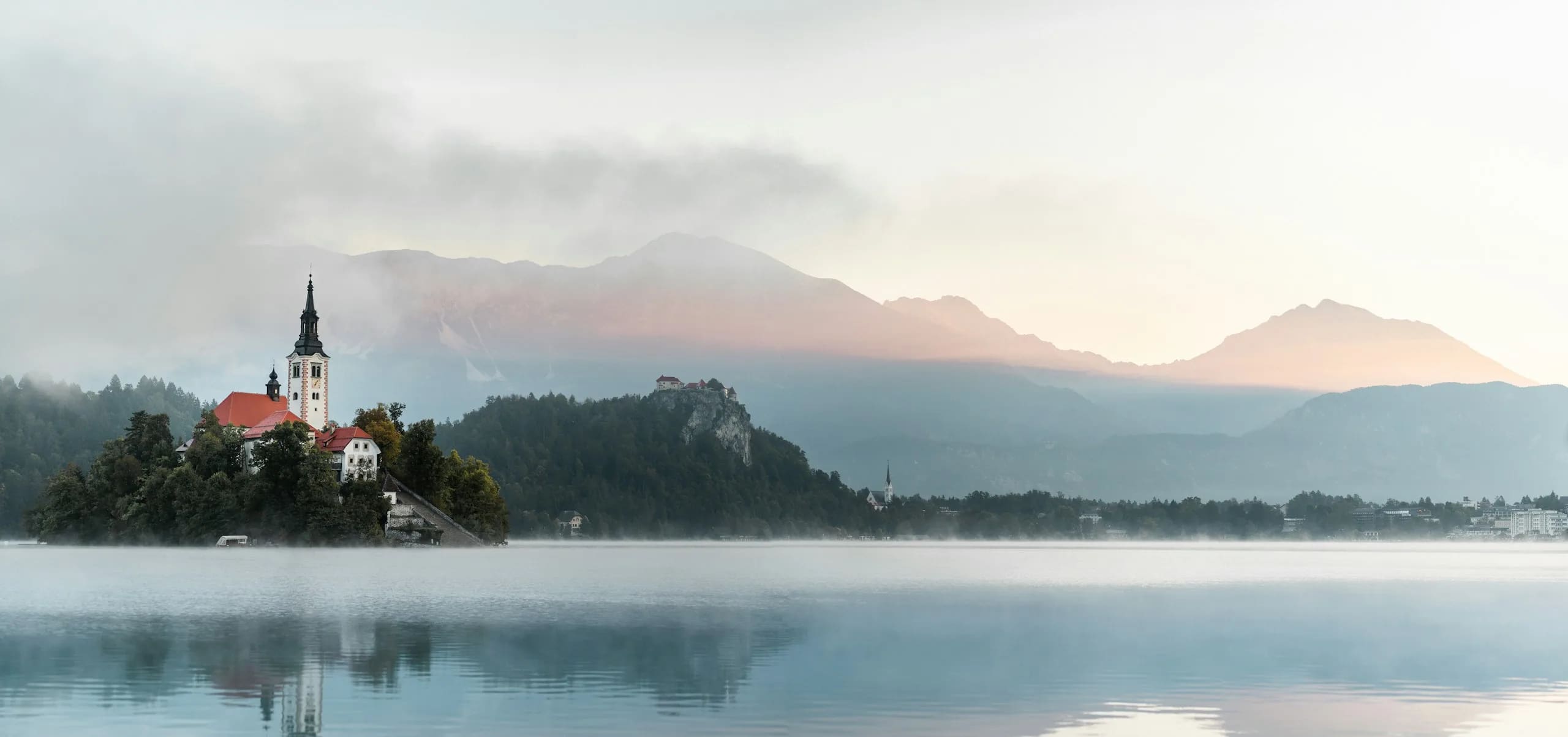Lake Bled with its island church and mountains in Slovenia